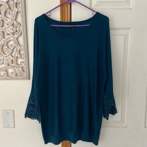 Talbots Women’s Teal Color Top with Crochet On the sleeves. Size Large.
